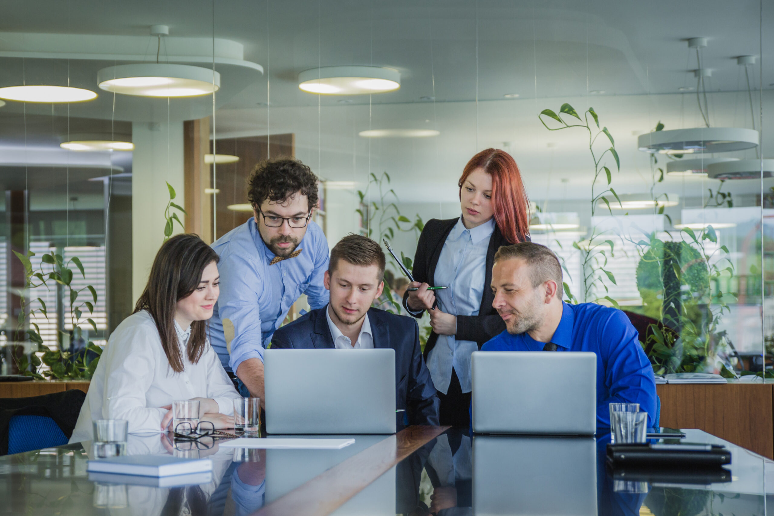people with laptops office